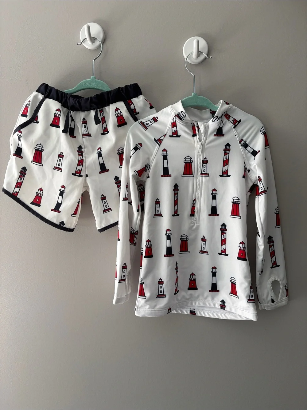 Monica + Andy like new swim trunk/rash guard set